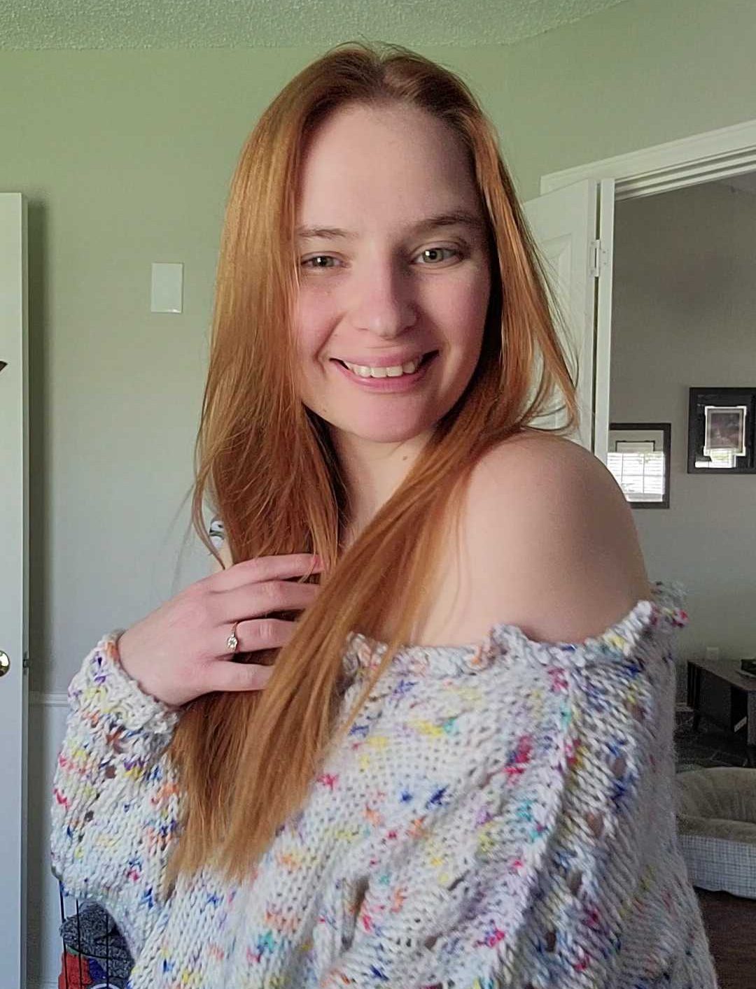 woodlandmermaidmakes wearing a hand-knit sweater in a confetti sprinkle colorway