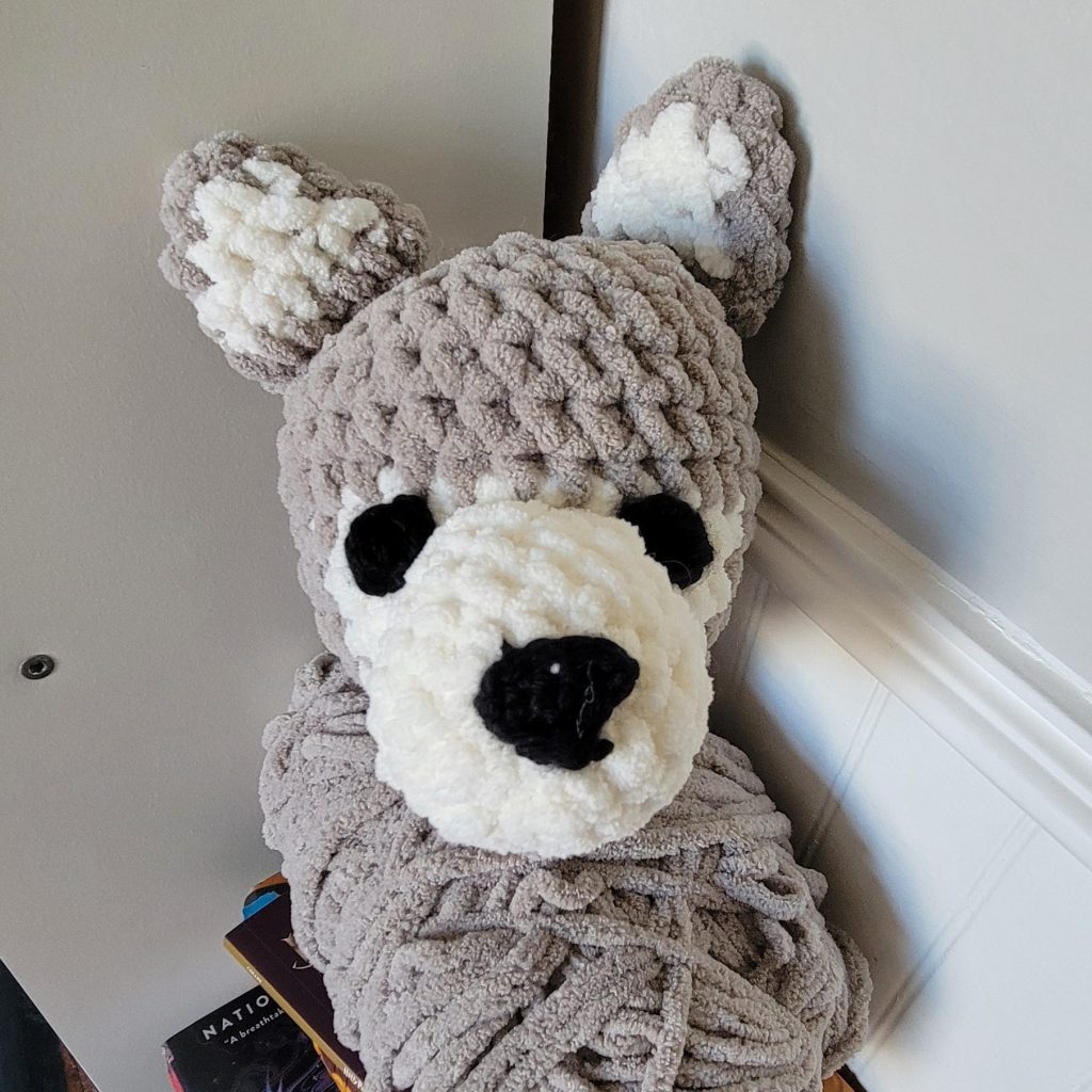 crochet wolf snuggler front head